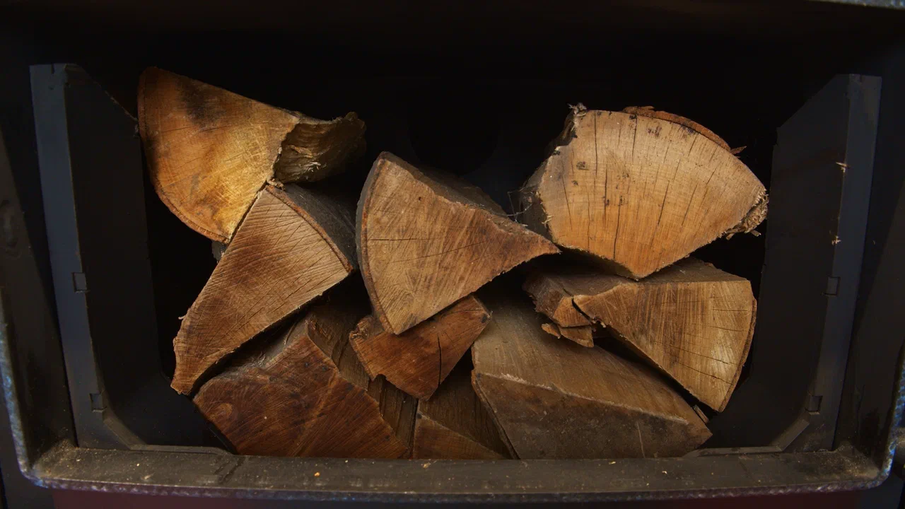 Logs loaded into the ATTACK SLX boiler chamber