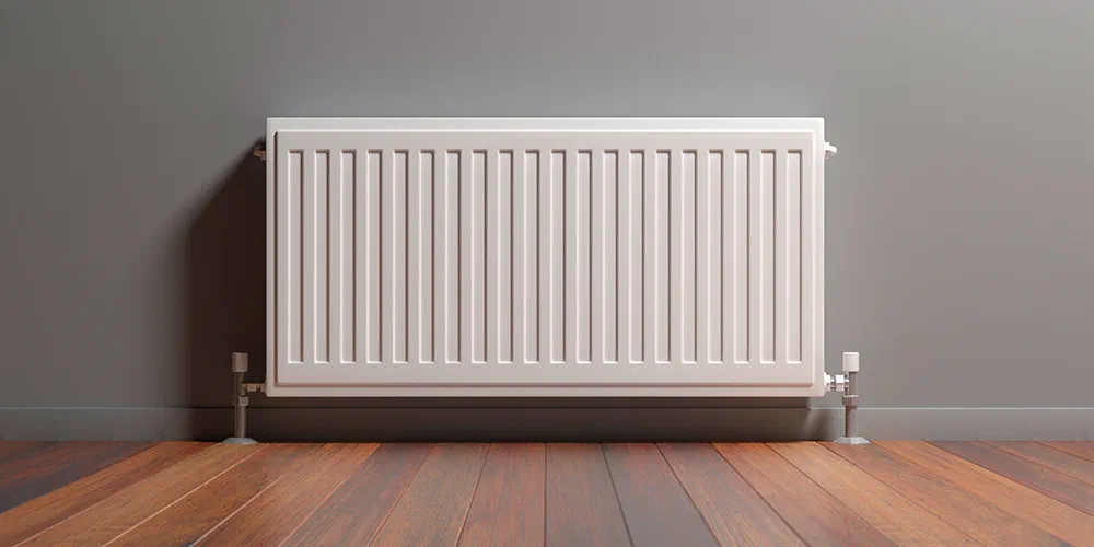 Radiator in a home with a heat pump